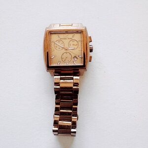 Vintage MK 5331 men's/women's quartz watch with a 37mm case, in working